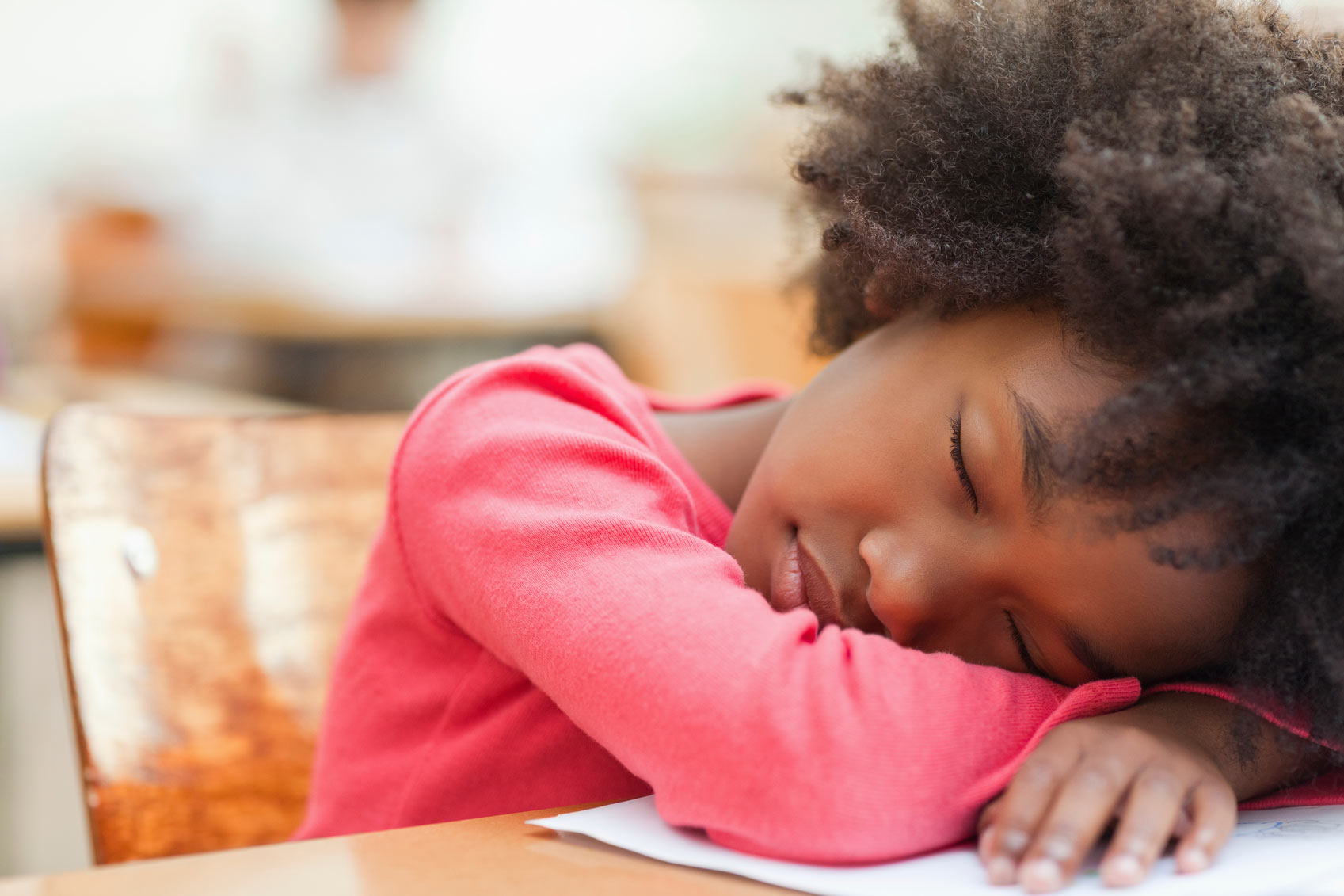 Girl asleep on desk